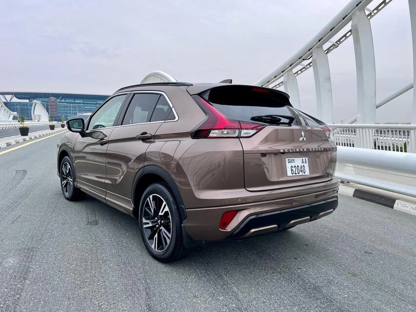 Car rental Mitsubishi Eclipse in Dubai 2023 (brown)