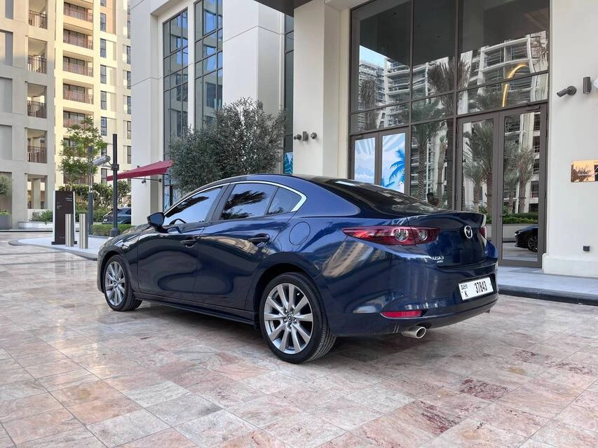 Car rental Mazda 3 in Dubai 2021 (dark-blue)